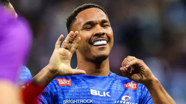DHL Stormers' Suleiman Hartzenberg celebrates scoring a try