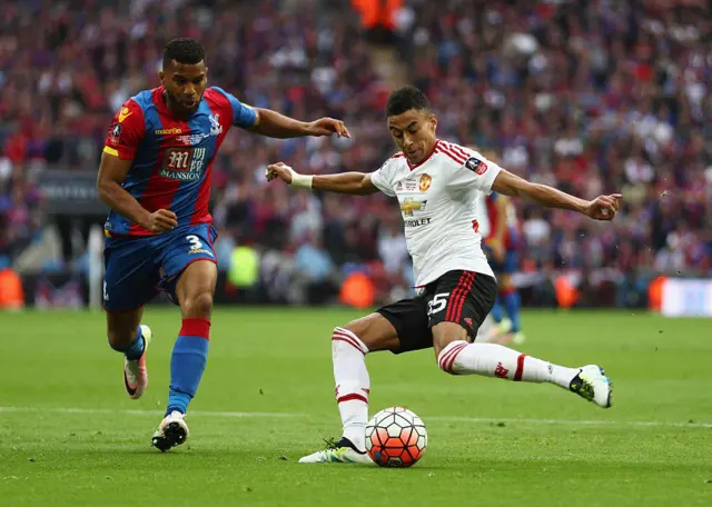 Jesse Lingard hits the ball