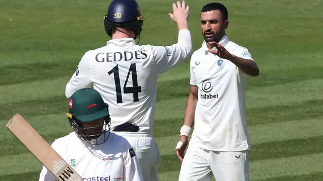 Middlesex's Zafar Gohar celebrates getting out Leics batter Ian Holland