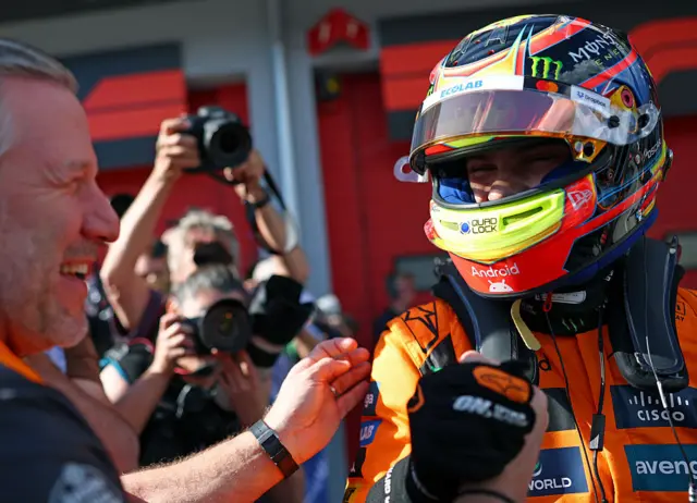 Oscar Piastri celebrates pole position with McLaren CEO Zak Brown