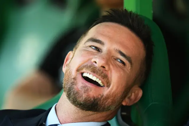 Barry Ferguson enjoys a laugh in the Hibs dugout