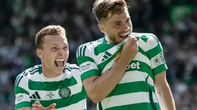 Alistair Johnston celebrates with James Forrest