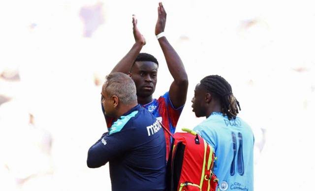 Crystal Palace's Marc Guehi applauds fans