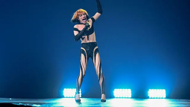 Nemo Performs his new song in a black and transparent body suit and Marlene Dietrich wig