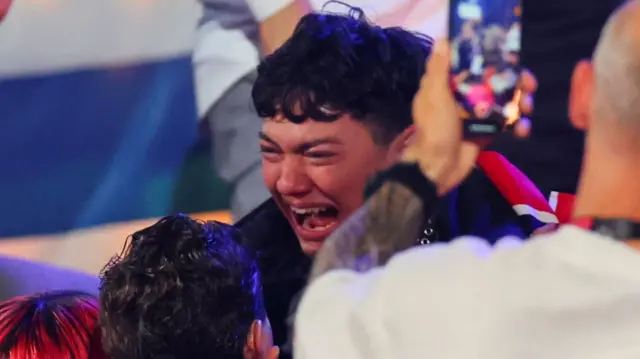 JJ in tears as he celebrates his win with family and supporters