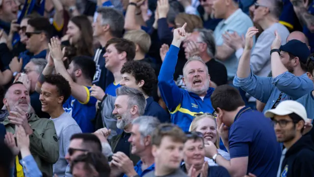AFC Wimbledon fans celebrate