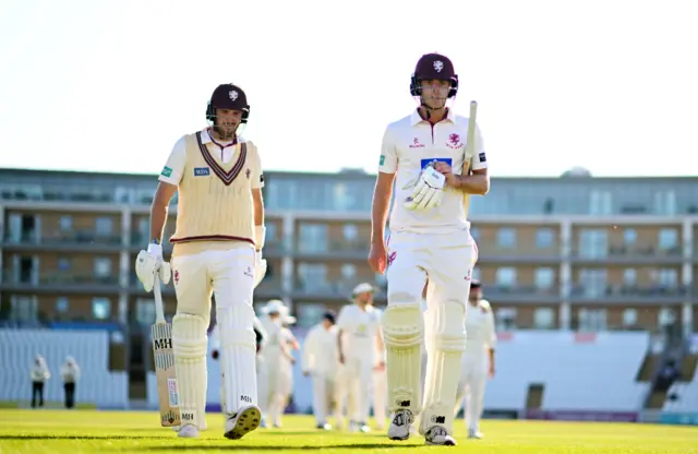 Somerset's Craig Overton and Archie Vaughan leave the field at Taunton after the first day of action against Sussex