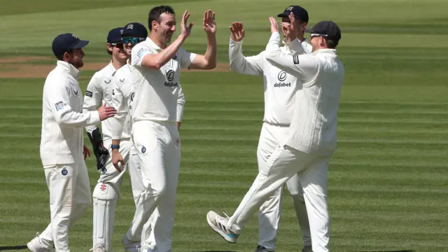 Middlesex celebrate Toby Roland-Jones taking a wicket against Leics