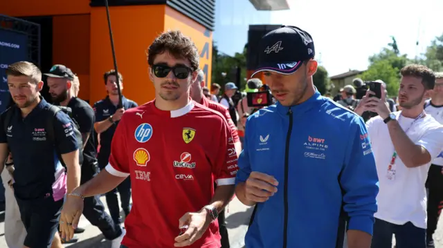 Charles Leclerc and Pierre Gasly arrive at Imola before practice on Saturday