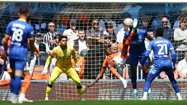 Mai Traore tries an overhead kick