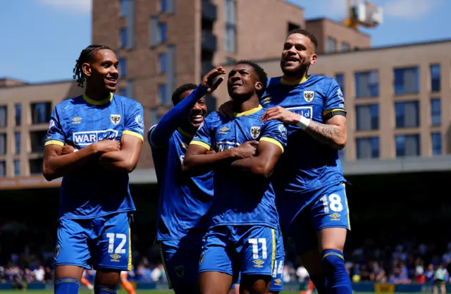 AFC Wimbledon celebrate Josh Neufville's goal