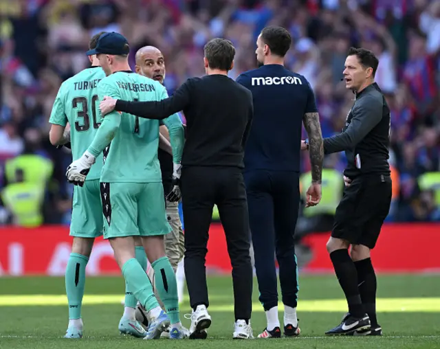 Pep Guardiola, Manager of Manchester City, clashes with Dean Henderson
