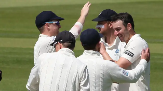 Middlesex celebrate Toby Roland-Jones taking a wicket against Leics