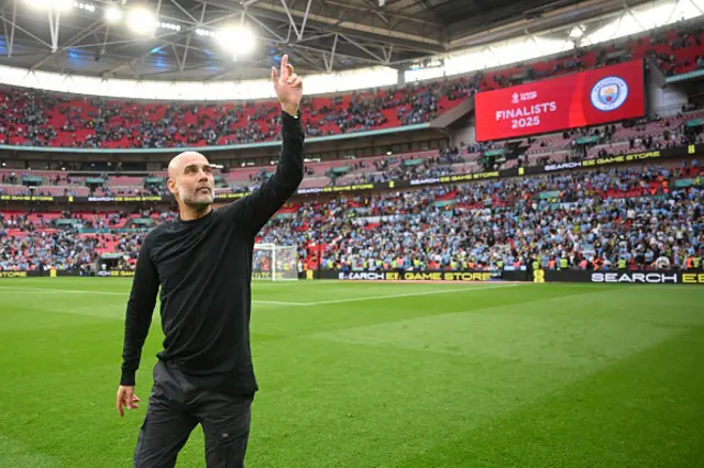 Pep Guardiola, Manager of Manchester City, celebrates