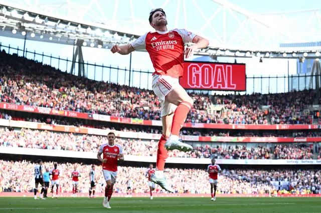 Declan Rice of Arsenal celebrates scoring his team's first goal during the Premier League match between Arsenal FC and Newcastle United FC at Emirates Stadium on May 18, 2025
