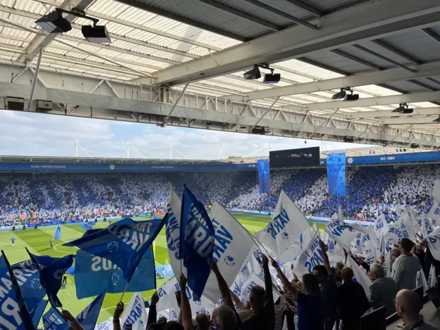 Fans wave Vardy flags