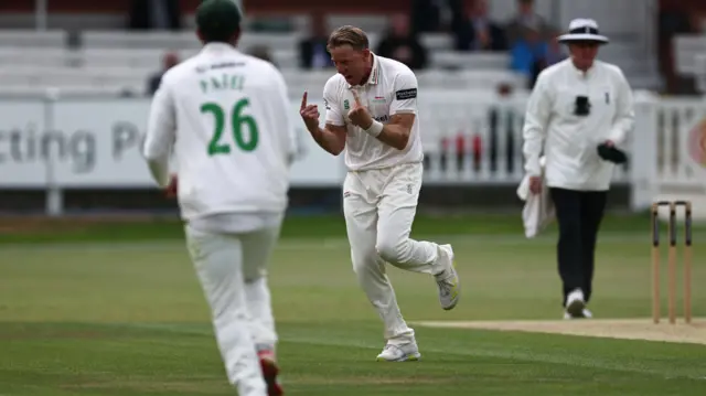 Leics seamer Logan van Beek celebrates getting out Middlesex batter Jack Davies