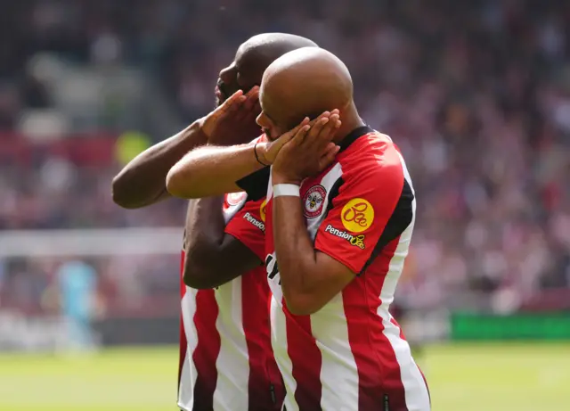 Brentford's Bryan Mbeumo (centre) celebrates with team-mates