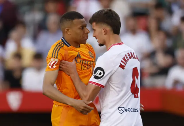 Kylian Mbappe and Kike Salas clash