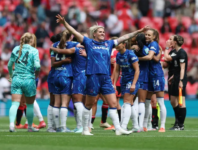 Millie Bright and Chelsea players celebrate