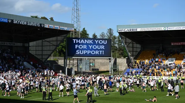 Fans on the pitch at McDiarmid Park