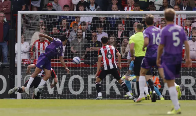 Fulham's Raul Jimenez scores their first goal.