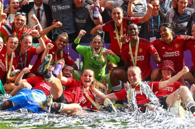 Manchester United women lift FA Cup trophy after winning final against Tottenham