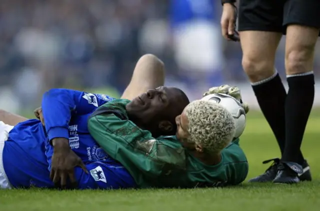 West Ham keeper David James has a word with Kevin Campbell