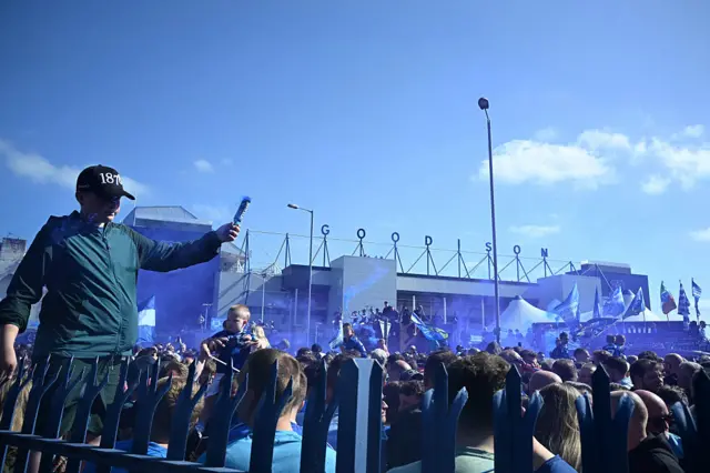 Fans gather outside of Goodison Park ahead of the English Premier League football match between Everton and Southampton