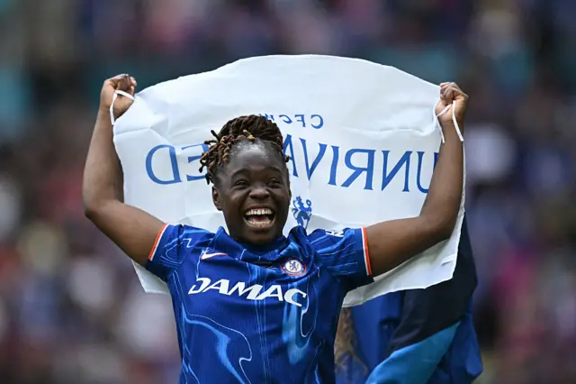 Sandy Baltimore celebrates