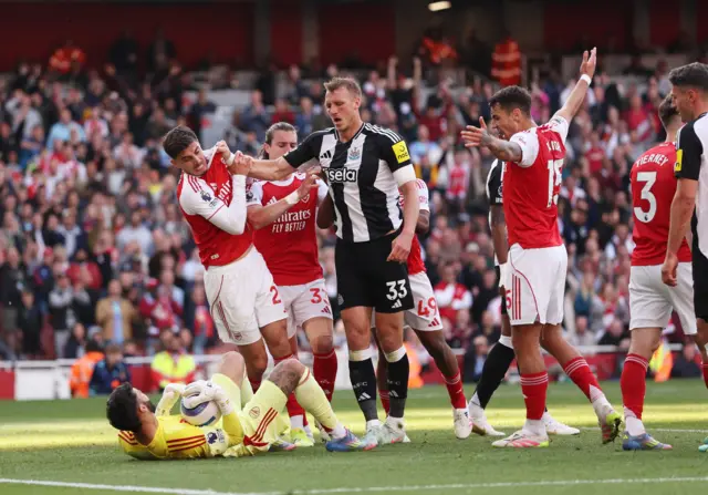 Arsenal's Kai Havertz and David Raya clashes with Newcastle United's Dan Burn