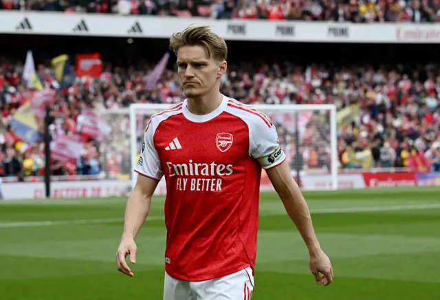 Martin Odegaard of Arsenal looks on prior to the Premier League match between Arsenal FC and Newcastle United FC at Emirates Stadium on May 18, 2025 in London, England.