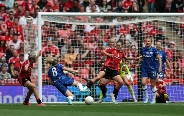 Manchester United's Celin Bizet fouls Chelsea's Erin Cuthbert to concede a penalty