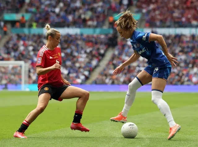 Manchester United's Celin Bizet in action with Chelsea's Nathalie Bjorn