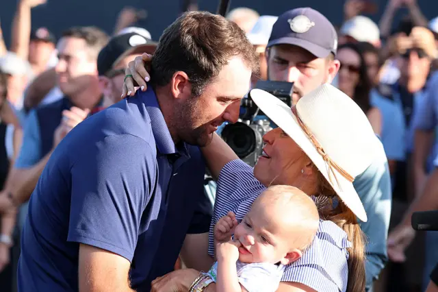 Scottie Scheffler celebrates with his family