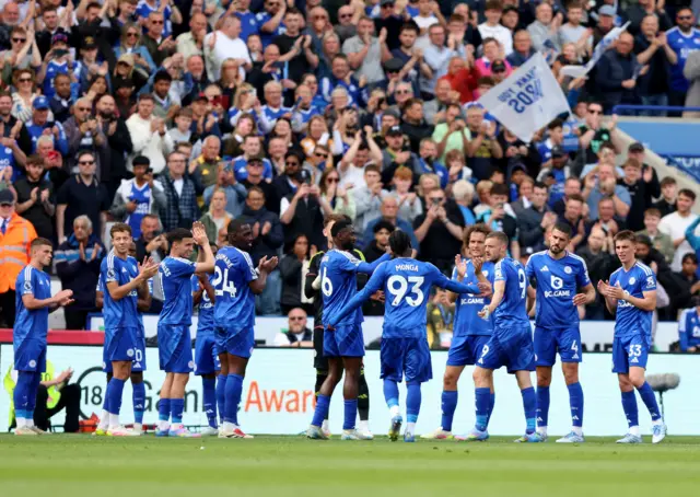 Leicester City's Jamie Vardy (third right) is given a guard of honour as he leaves the pitch after being substituted during the Premier League match at King Power Stadium, Leicester.