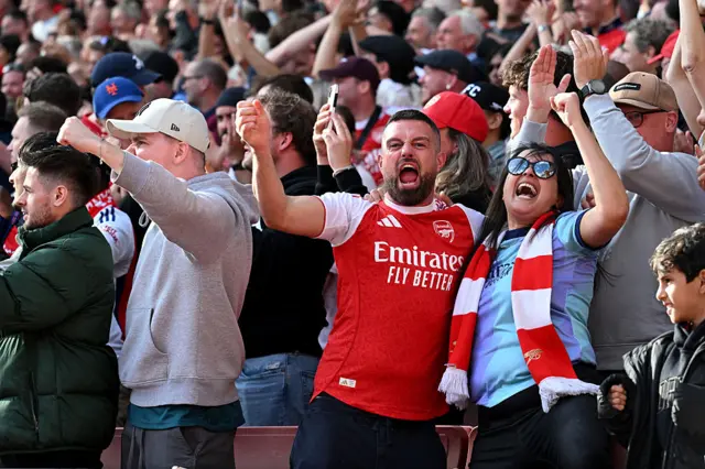 Fans of Arsenal celebrate after Declan Rice of Arsenal (not pictured) scores his team's first goal during the Premier League match between Arsenal FC and Newcastle United FC at Emirates Stadium