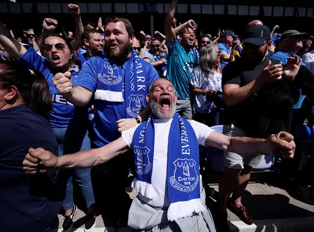 Everton supporters celebrate their side's first goal during the Premier League match between Everton FC and Southampton FC at Goodison Park on May 18, 2025 in Liverpool, England.