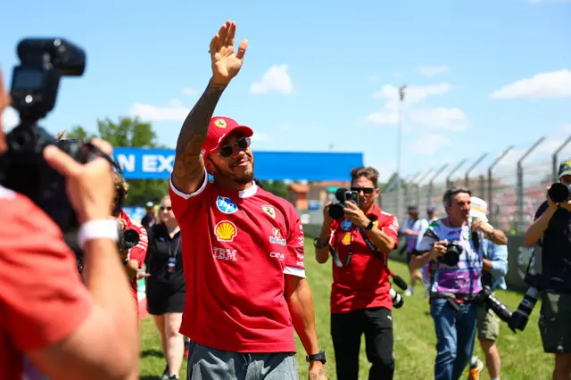 Lewis Hamilton waves to the crowd