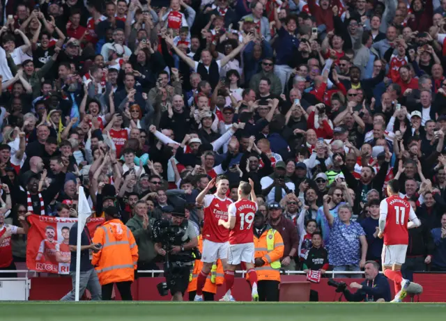 Arsenal's Declan Rice celebrates scoring their first goal with Leandro Trossard