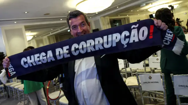 A supporter of Portugal's far-right political party Chega reacts, following the exit polls of the general election in Lisbon, Portugal, May 18, 2025