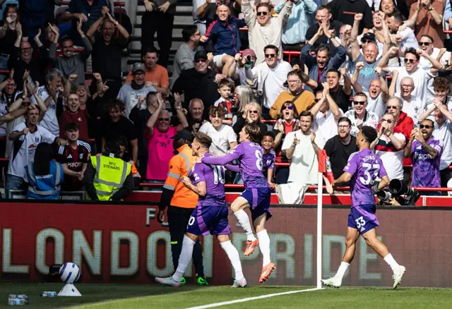 Fulham's Tom Cairney (left) celebrates scoring his side's second goal