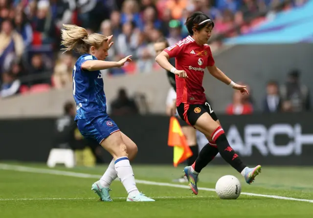 Chelsea's Erin Cuthbert in action with Manchester United's Hinata Miyazawa