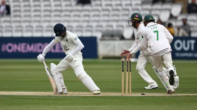 Middlesex's Zafar Gohar looks on after being bowled by Leics seamer Ben Green