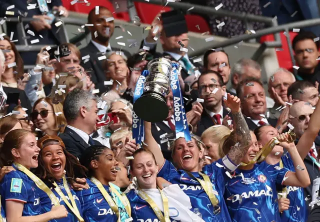 Chelsea players celebrate with FA Cup