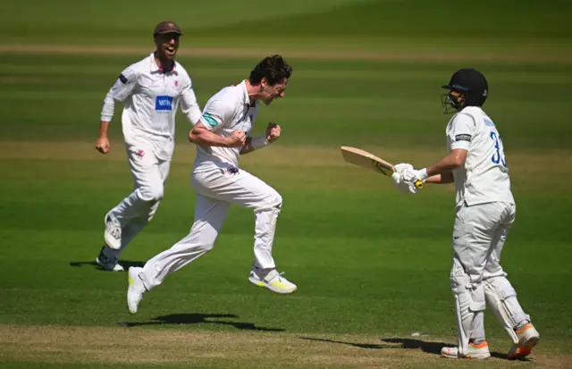 Somerset bowler Matt Henry celebrates getting out Sussex's Fynn Hudson-Prentice