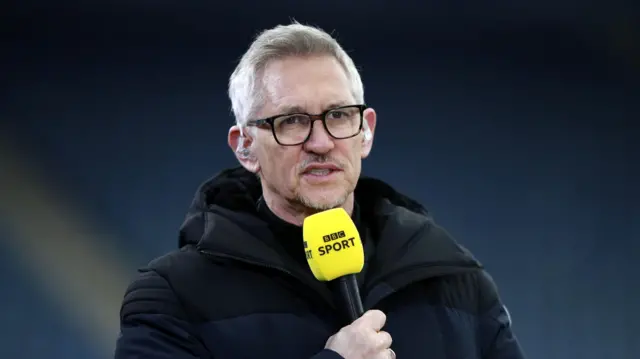 Lineker holding a BBC Sport microphone
