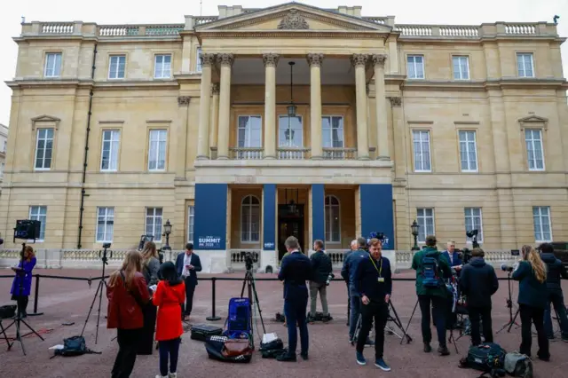 Members of the media outside Lancaster House ahead of EU - UK Summit in London