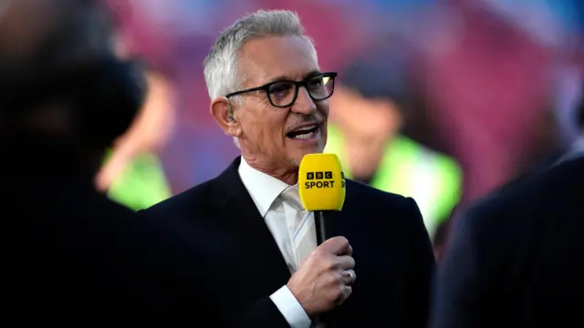 Lineker holding a yellow BBC Sport mic