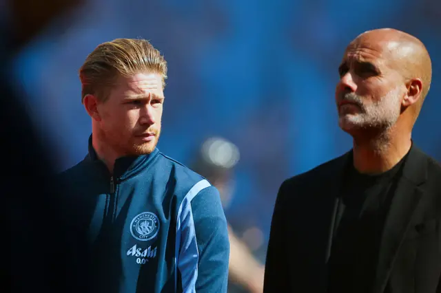 Kevin De Bruyne of Manchester City and Pep Guardiola